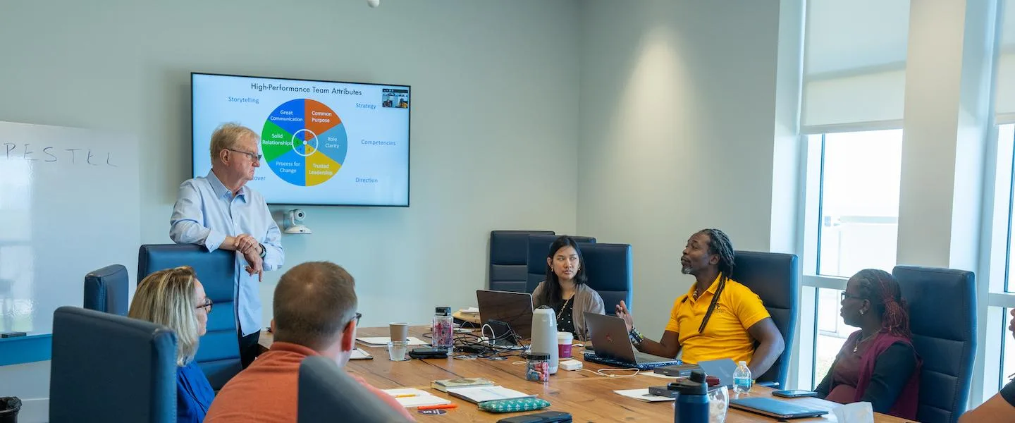 A facilitator leading a leadership governance workshop