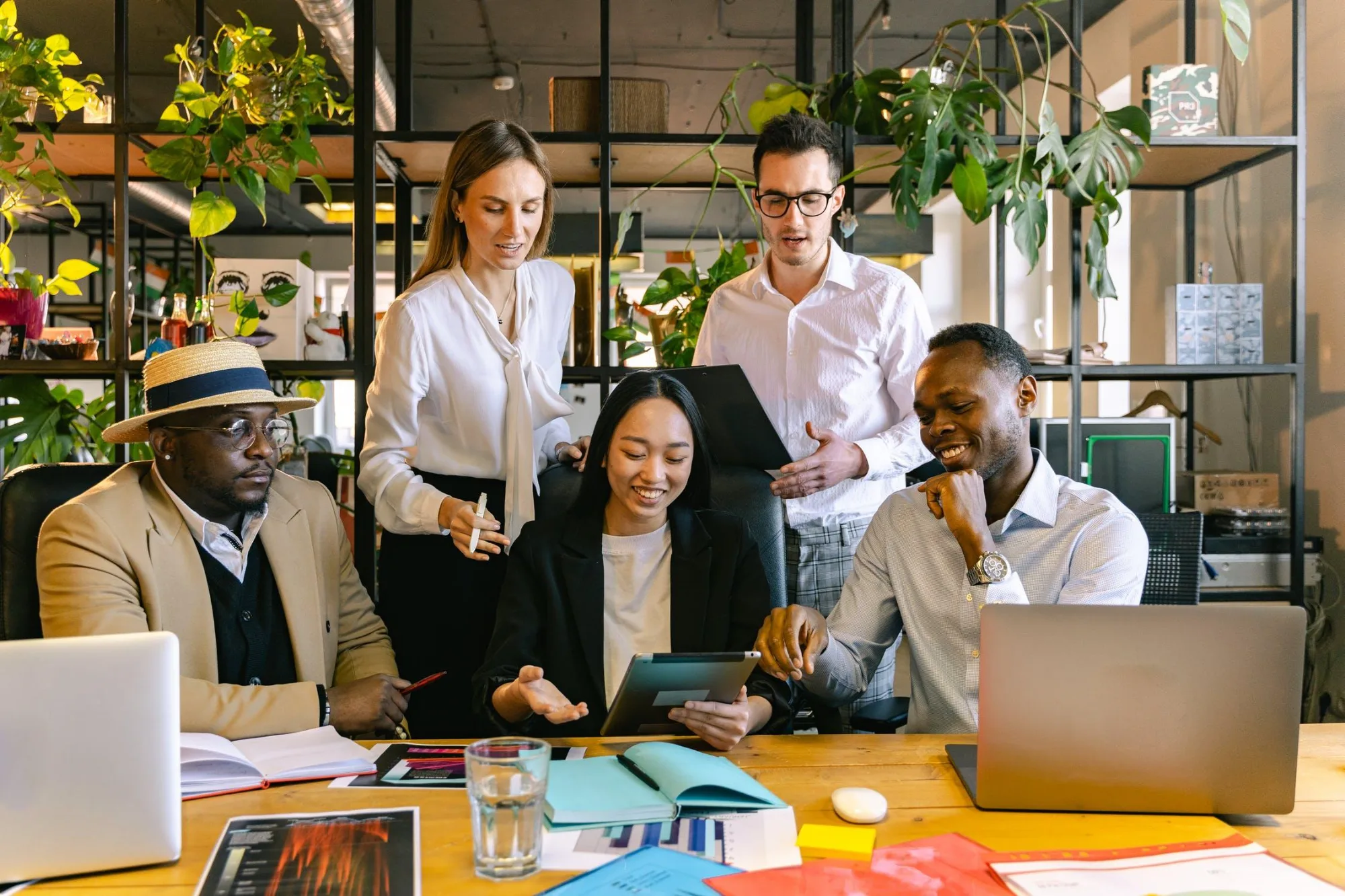 A diverse group of business leaders in a strategy and technology workshop